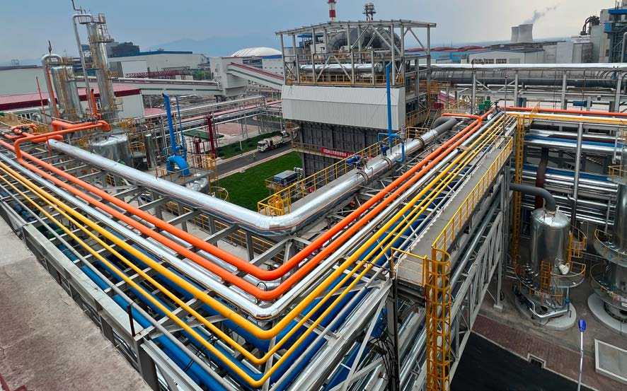Pipe racks and process plant at the MCC CERI hydrogen metallurgy facility in Zhangjiakou, Hebei